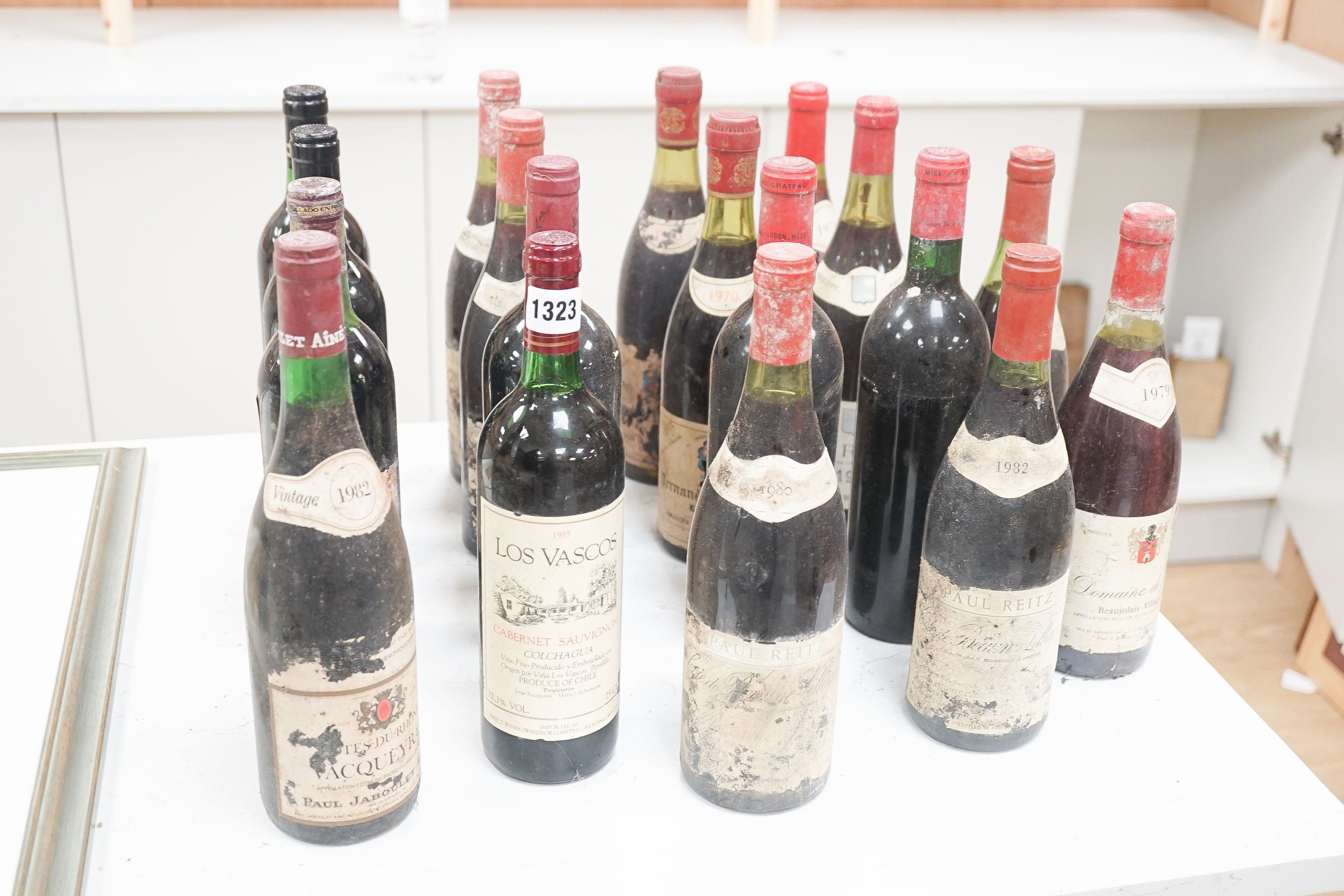 18 bottles of mixed red wines to include - two Chateau La Lagune, labels lacking so undated, one Paul Jaboulet Aine Cotes du Rhone Vacqueyras etc.